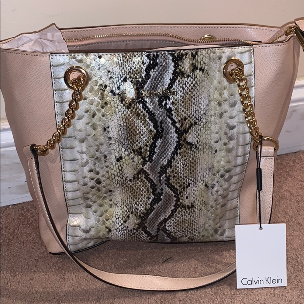 Calvin Klein new tan snakeskin bag.